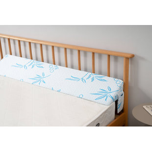 Cot bed outlet wedge